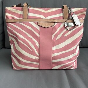 Used pink zebra Coach handbag with dust bag